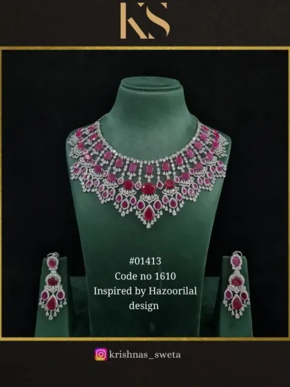 A classic ruby red version of the Hazoorilal-inspired set, perfect for a bridal look.