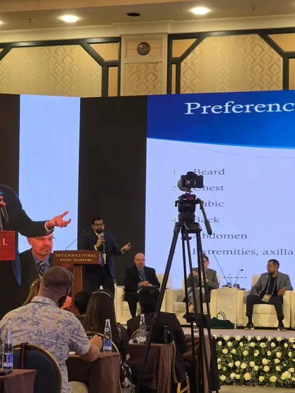Speaking at the podium during LAHRC 2025. These events are a great platform for academic exchange and networking with peers.