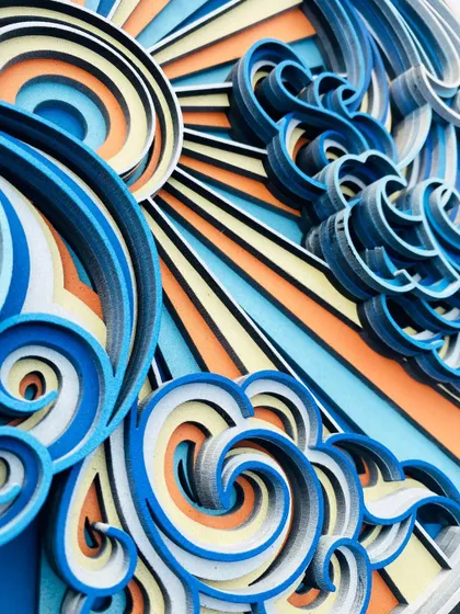 Another close-up of the Sea Wave art, focusing on the sun's rays and the cresting waves. The vibrant color palette is both cheerful and dramatic.