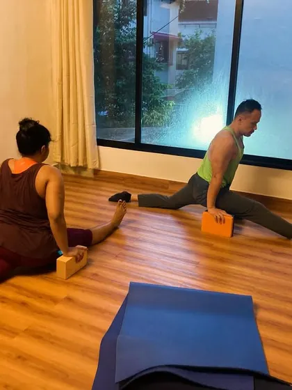 Another example of using blocks to support the splits. This allows students to work on their flexibility without forcing the body, ensuring a safe and effective stretch.