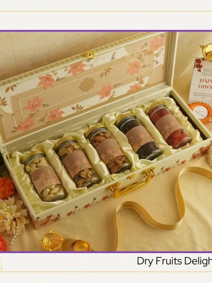 My "Dry Fruits Delight" hamper is a healthy and traditional Diwali gift. It features a floral-printed suitcase box filled with an assortment of premium nuts and dried fruits.