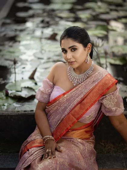 A modern bridal portrait by a serene water lily pond. This is a duplicate of ID 18, showcasing a beautiful blend of modern bridal style and traditional elegance.
