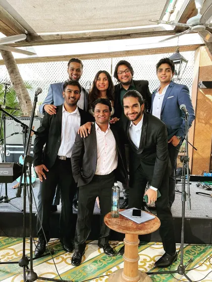 The whole crew together after a fantastic gig. We started as friends and that's how we operate, bringing a genuine, close-knit energy to every performance.