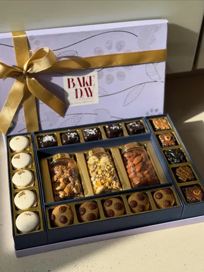 The Ultimate Sweet Treat Hamper for Diwali, featuring a luxurious assortment of macarons, cookies, brownies, and three jars of our signature dry fruits.
