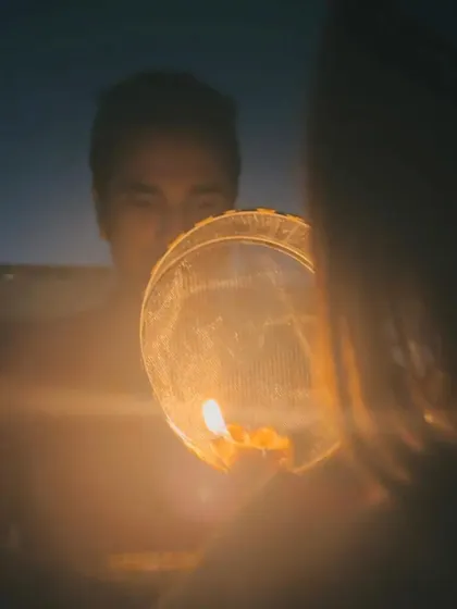 An artistic shot of Dilpreet and Ishvinpal during their Karwa Chauth celebration. A pilot and a musician, they found their rhythm through our personalized guidance.
