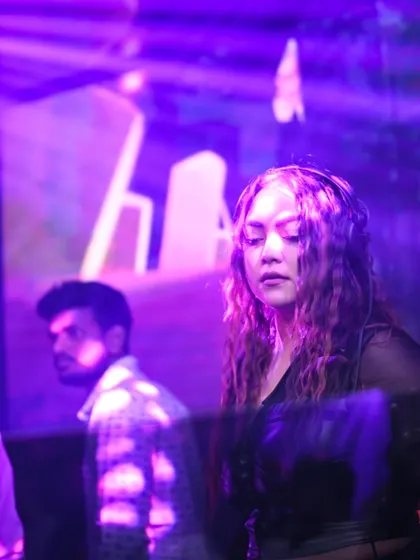 Another shot of me in deep concentration, with purple club lights creating a cool mood.