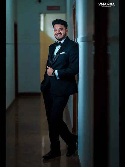 A duplicate of 14, a handsome and classic groom portrait.