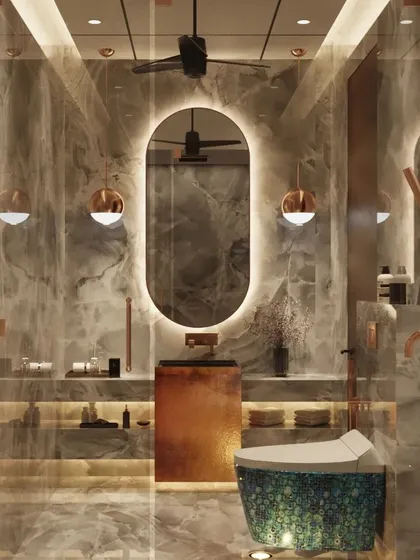 This modern toilet design uses grey marble and rose gold fixtures to create a look of understated luxury. The oval backlit mirror and unique pendant lights add a touch of glamour, while the custom vanity provides ample storage.