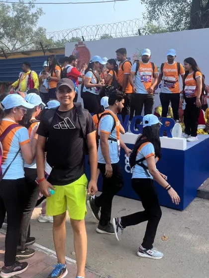Another photo from the marathon event, with other participants in the background.