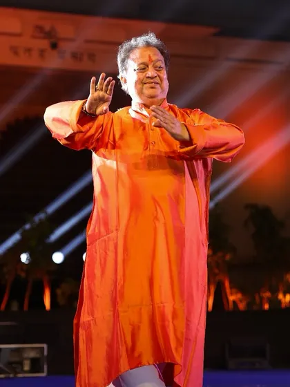 Pt. Jai Kishan Maharaj ji performing 'abhinaya' at the Meera Mahotsav, his expressions telling a timeless story.