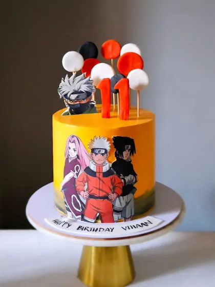 A Naruto theme cake with sharp colors and clean lines. This whipped cream cake is perfect for an anime fan's birthday celebration.