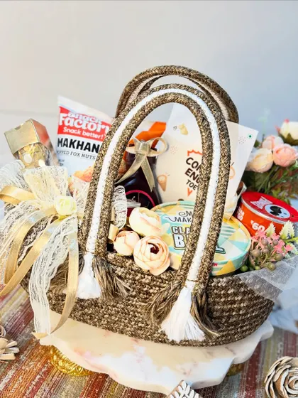 We believe in creating gifts that are both beautiful and useful. This goodie basket, with its sturdy jute handles and thoughtful contents, is a perfect example of our commitment to affordable luxury.