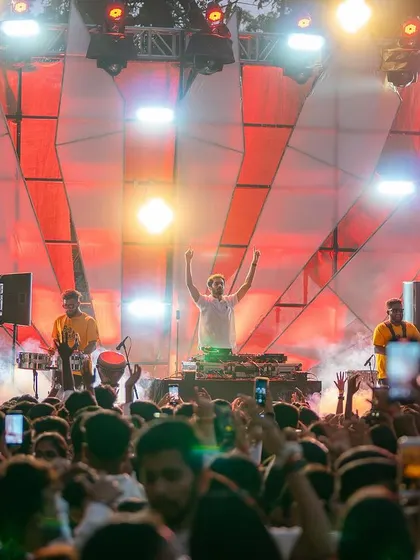 Performing with the Beat Gurus percussion team at MCC's White Summerland. The stage was lit, the crowd was massive, and the energy was off the charts.