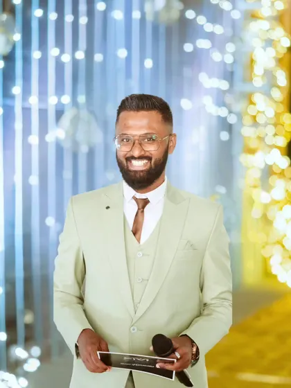 As a planner and an anchor, I am personally invested in the flow and energy of your celebration. Here, I'm hosting Ryan and Ela's reception, ensuring the evening is not just well-organized but also filled with genuine connection, laughter, and joy.