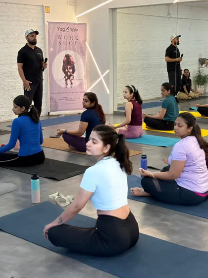 Our instructor leads a session during our Yoga Sangam event for International Yoga Day. It was a day of shared practice, learning, and celebrating the unifying spirit of yoga.