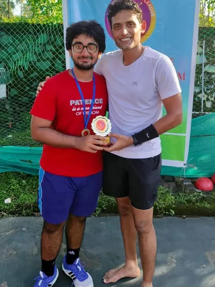 Two of our players celebrating their tournament win. We foster a supportive community where players push each other to succeed.