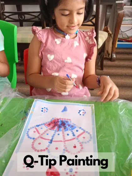 Q-Tip painting is one of the creative activities we offer at our summer camps to develop fine motor skills.