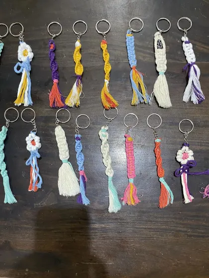 A closer look at the different macrame keyrings my daughter created. Each one is unique.