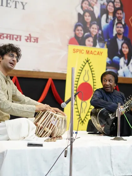 Interacting with the audience during a SPIC MACAY concert with Ustad Shahid Parvez Khan Sahab. These concerts are vital for introducing the next generation to our rich classical traditions.