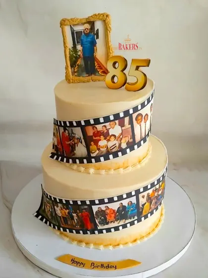 This cake was for a very special 85th birthday, and we wanted it to tell a story. I designed this two-tier cake with an edible photo reel showcasing precious memories from over the years. It’s a beautiful way to personalize a celebration, and this one was a fresh fruit cake, made with absolutely no fondant.