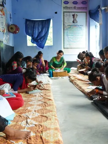 A wider view of our workshop space. The girls are spread out on the floor, each one focused on her own creation. This program was about creating a possibility for these girls to have a life devoted to art, something that once felt like a distant dream for me.