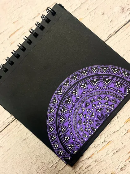 A purple semi-mandala for the fourth day of Navratri, dedicated to Mata Kushmanda, who presides over the heart chakra.