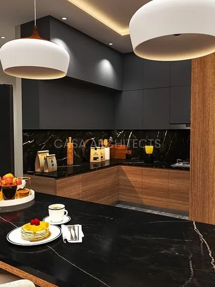 This render provides a close-up of a kitchen bar, showcasing a black marble countertop perfect for serving, with a view into the well-equipped cooking area.