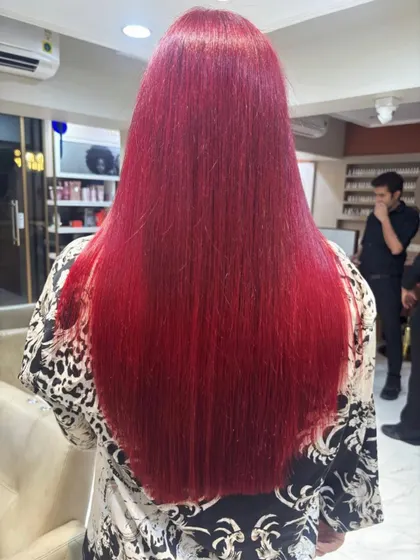 For clients who want to make a statement, a vibrant global color is the perfect choice. I achieved this rich, fiery red that is consistent from root to tip, delivering a bold and confident look with incredible shine.