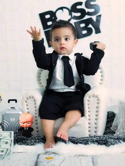 The Boss Baby is in charge. This little one has the perfect commanding pose for this fun and creative themed photoshoot.