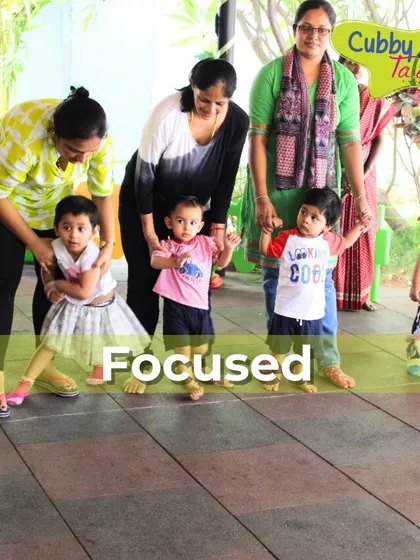 Taking their first steps together. With the focused support of our caregivers, even our youngest toddlers participate in group activities, building their confidence and motor skills in a safe and encouraging setting.