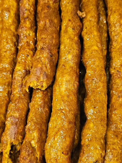 Our juicy and flavorful mutton seekh kebabs. These are a classic choice for any celebration, grilled over charcoal to get that perfect smoky taste.