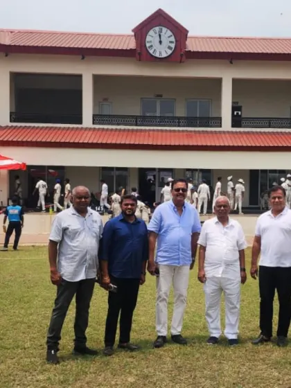 A group photo with the guests in front of the beautiful pavilion at our New Panvel ground.