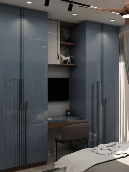 A closer look at the glossy, dual-toned wardrobe with fluted details, showcasing our attention to material selection and custom furniture design.