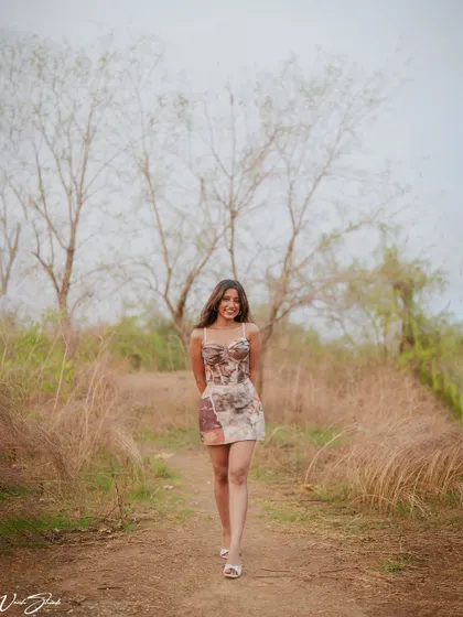 This is the full-body version of the happy, walking pose. It conveys confidence and movement, making it a strong addition to any model's collection of shots.