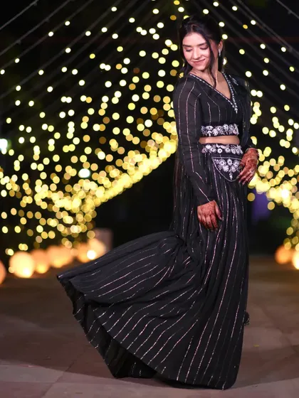 HD party makeup for an evening event. The subtle makeup and simple hair let her beautiful black outfit do the talking.