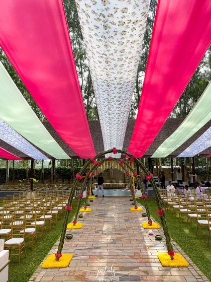 A duplicate image of the colorful and festive wedding aisle.