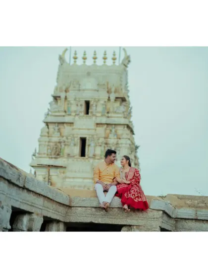A striking pre-wedding portrait on the steps of a historic temple. This shot combines architectural grandeur with the couple's personal story.