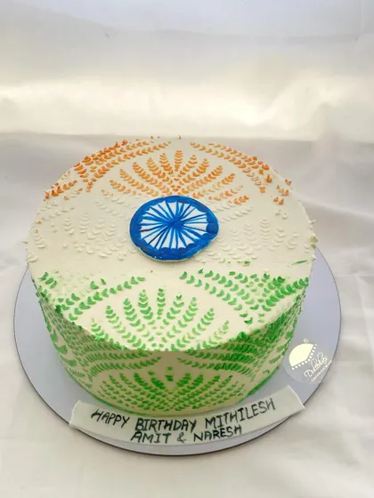 A patriotic cake with the Indian tricolor design, perfect for celebrating Independence Day or a national holiday.