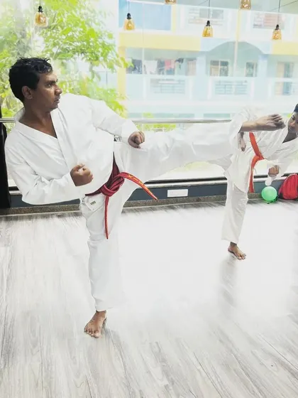 These images capture various moments from our training sessions and grading exams at different dojos, including Marathahalli and Malleshwaram, and at community events. Each picture shows the hard work and dedication that is central to our teaching philosophy.