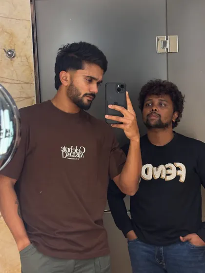 A mirror selfie with Nitish Kumar Reddy, showing off his fresh style.