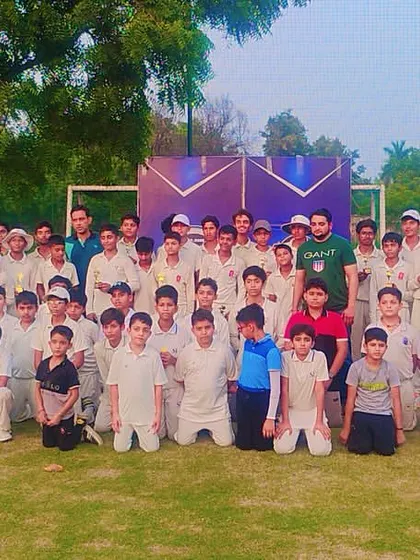 A group photo with all the young cricketers, celebrating a day of great competition and sportsmanship.