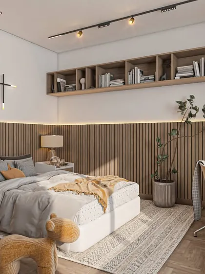 A stylish and functional older child's bedroom with wood-paneled walls and a built-in desk. The overhead bookshelf provides ample space for books, making it a great setup for studying.