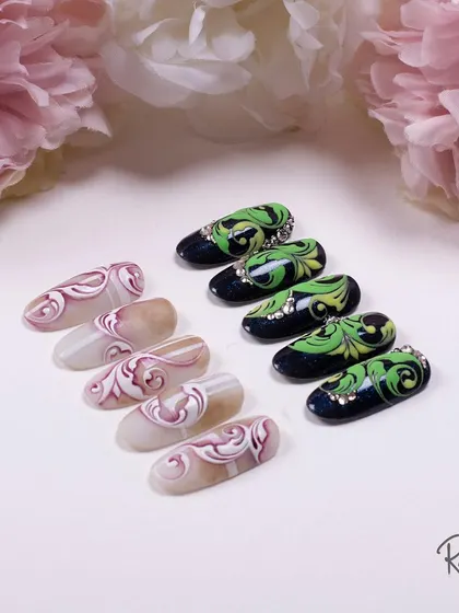 This set features two of my complex swirl designs. One has a soft, marbled look, while the other is a bold black and neon green with crystal accents.