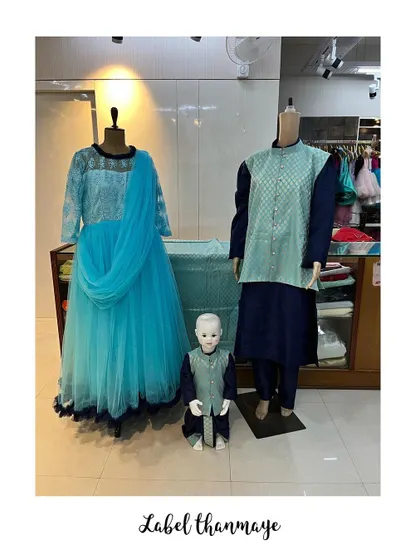 Family twinning is so much fun. I designed this coordinated set for a family, including a blue gown for the mother, a matching kurta set for the father, and a mini version for their son.