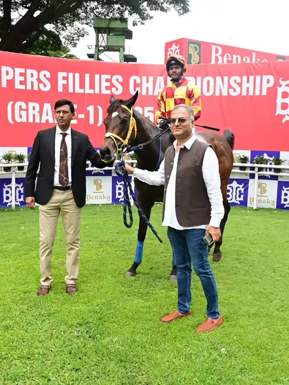 Diablo, with jockey P. Sai Kumar, after winning The Justice P. Medapa Memorial Trophy.