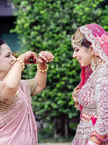 A beautiful, emotional moment between the bride and her mother, both adorned with our mehandi. These are the memories we are honored to be a part of.