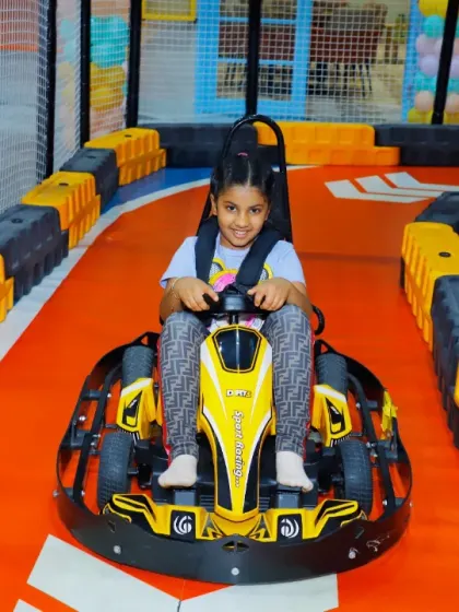 This young lady is ready to race, showing off her style and confidence before hitting the track.