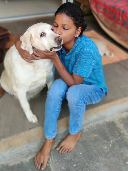 This is me with my inspiration, Whiskey. My journey into baking for dogs started with her, and every treat I make is filled with the same love and care I give her every day.