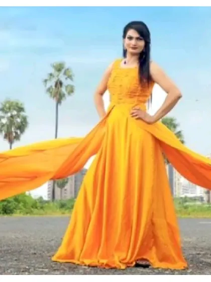 Let your spirit fly in this gorgeous yellow gown with a long, flowing trail. It's one of our most popular choices for pre-wedding photoshoots, creating stunning, dramatic pictures.