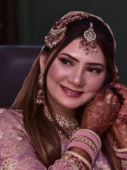 My beautiful engagement bride getting her final touches. Her makeup is soft and romantic, with a focus on glowing skin and a pretty lip color.